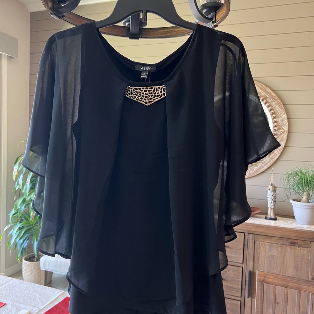 Black blouse with gold accent